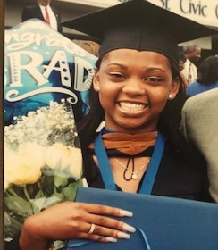 April Lynn Elder in her graduation regalia